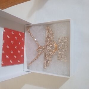 Elegant Gold Necklace with Winged Pendant